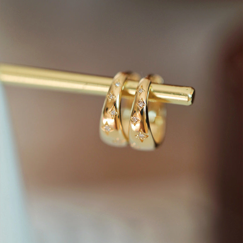 Boucles d’oreilles luxueuses en or et en argent