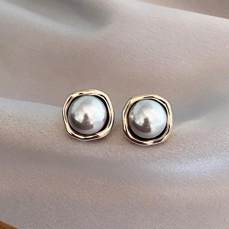 Boucles d’oreilles sophistiquées avec perles noires