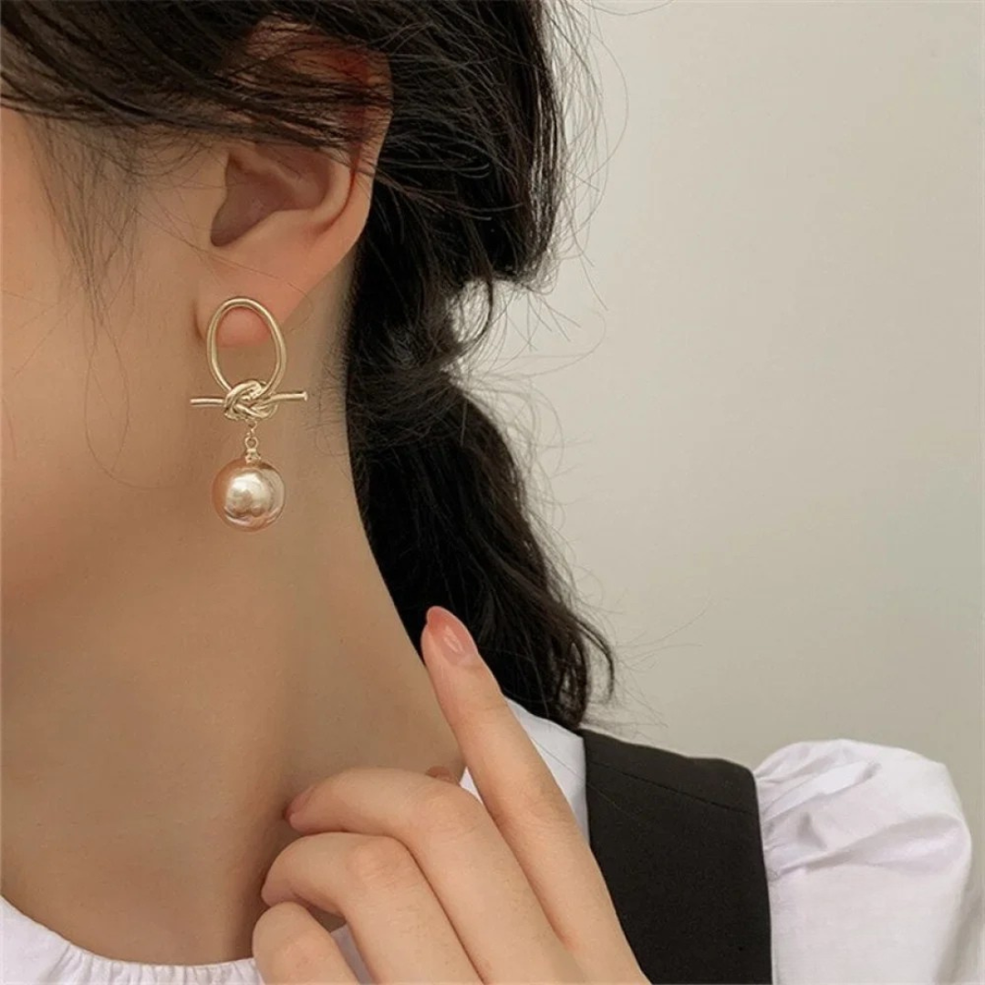 Boucles d’oreilles pendantes intemporelles avec perles