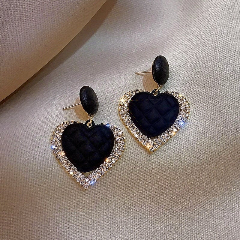 Boucles d’oreilles cœur noir en or