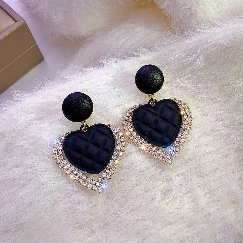 Boucles d’oreilles cœur noir en or