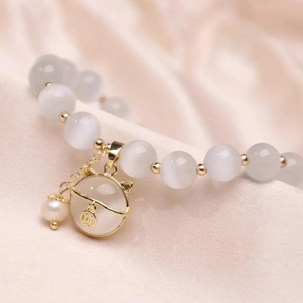 Bracelet à perles avec pendentif chat porte-bonheur